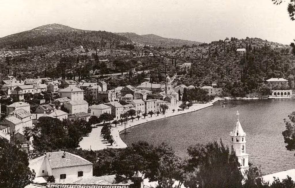 Black-and-white vintage postcard view of Cavtat waterfront and bay