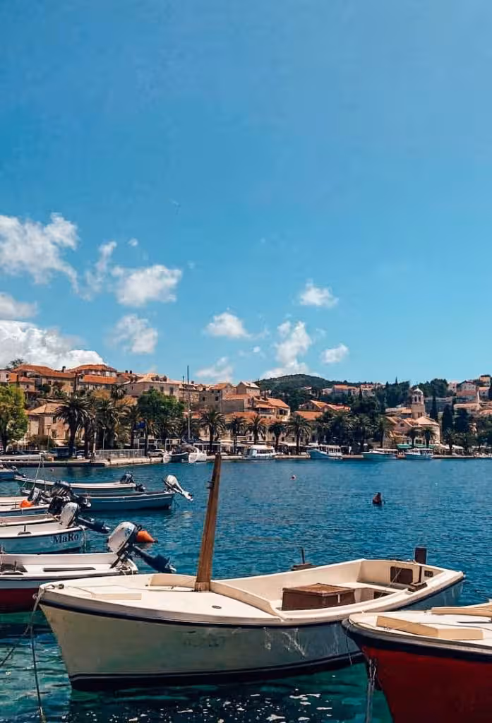 Cavtat Old Town waterfront promenade with benches and sea