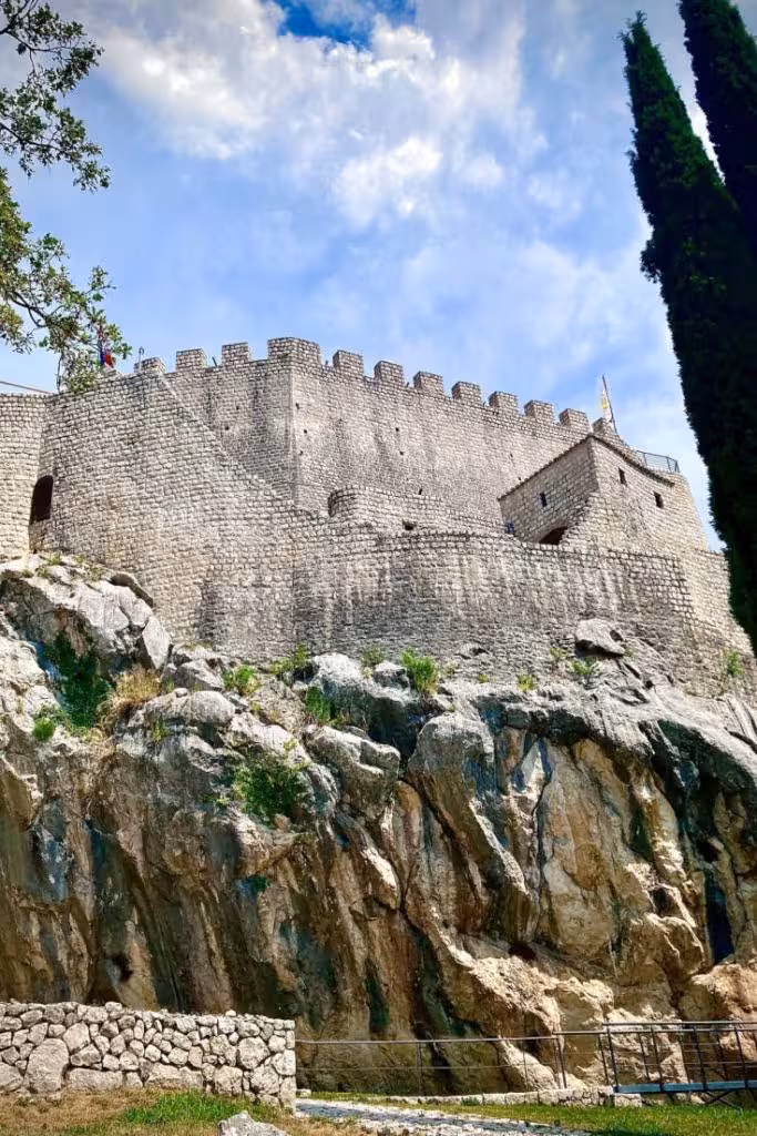 Sokol Grad Fort ruins above Cavtat coastline.