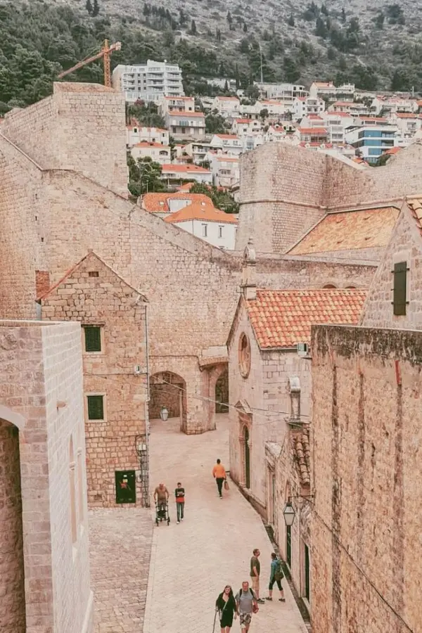 Dubrovnik walls towering above the Ploče Gate area.