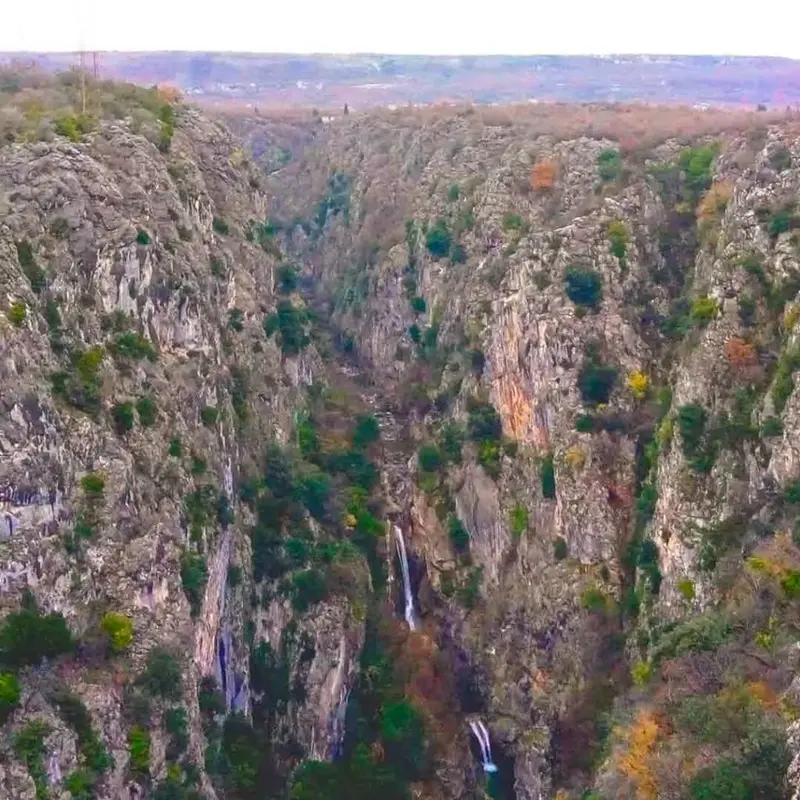 Gubavica Waterfall plunging into a deep canyon on the Cetina River.