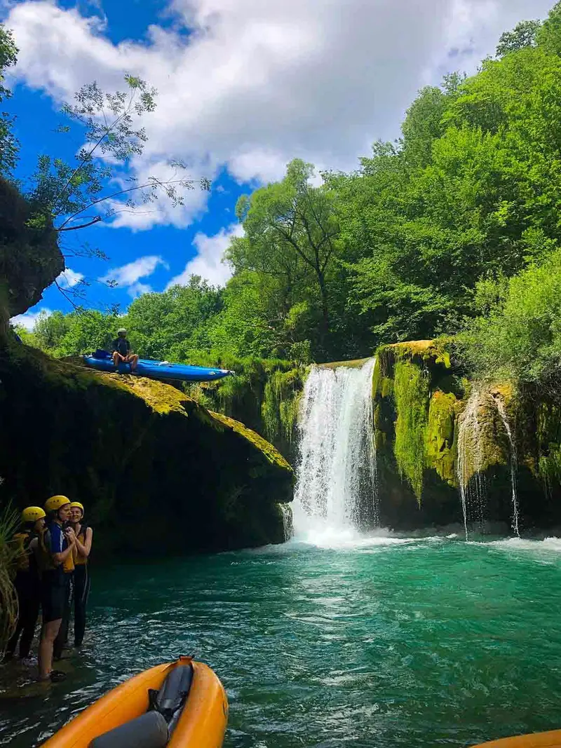 Series of low travertine waterfalls along the Mrežnica River.