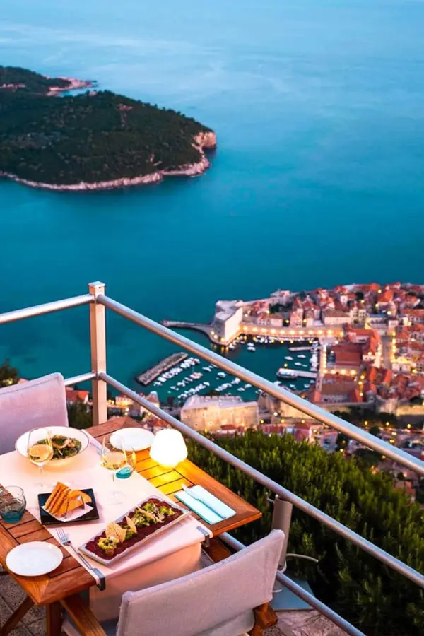Restaurant terrace on Mount Srđ overlooking Dubrovnik and the sea.