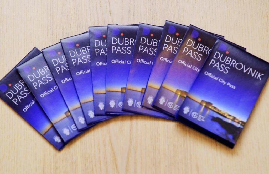 Physical Dubrovnik Pass cards displayed for purchase.