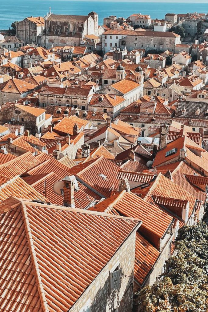 Red-tiled rooftops of Dubrovnik Old Town seen from the City Walls.