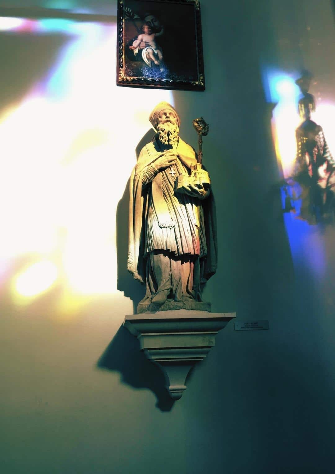 Statue of St. Blaise holding a model of Dubrovnik inside the church.