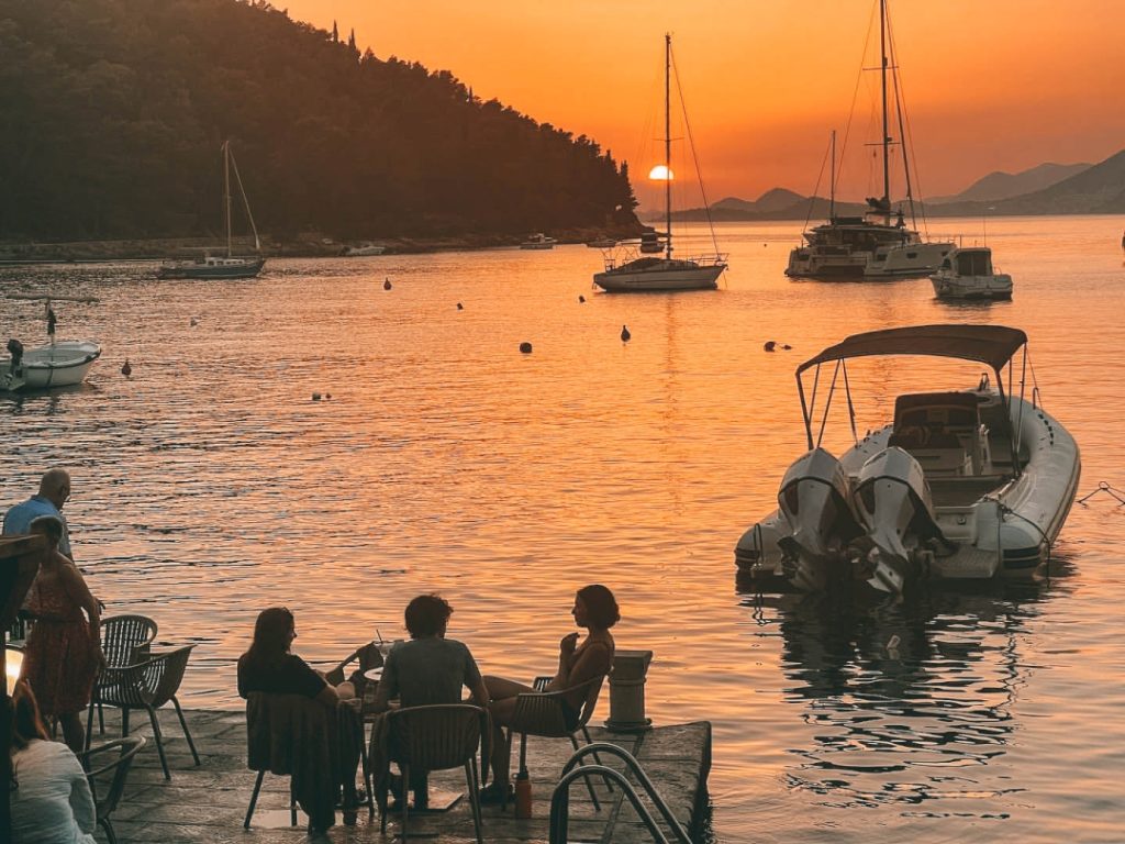 Banac Beach looks at Dubrovnik in the distance. View of the sun setting over Dubrovnik are magical.