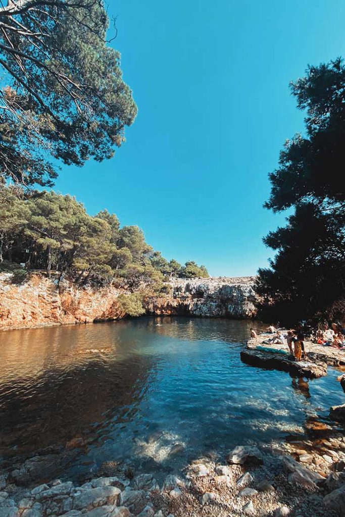 Photo of Lokrum Dead Slake cliffs from the beach area