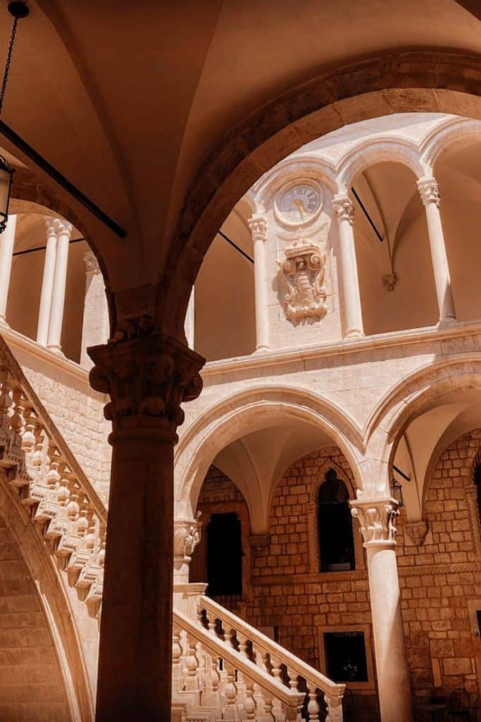 Image of Rector's Palace small courtyard showing staircase, arches and clock