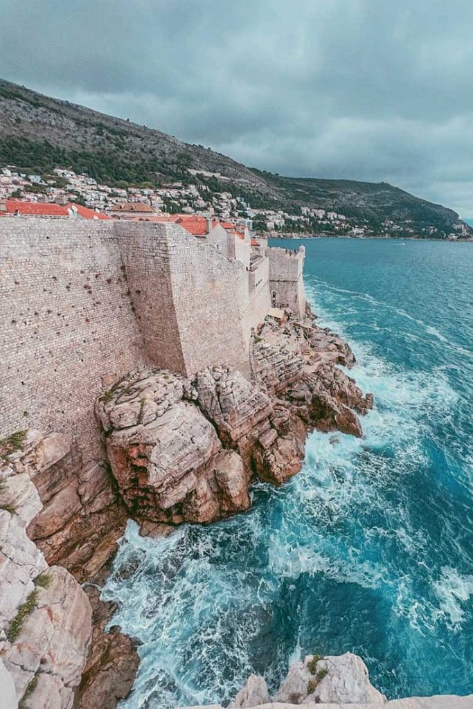 Dubrovnik City Walls Tickets — Where To Buy, Price & More 1 Seaside Walls image with wavy sea