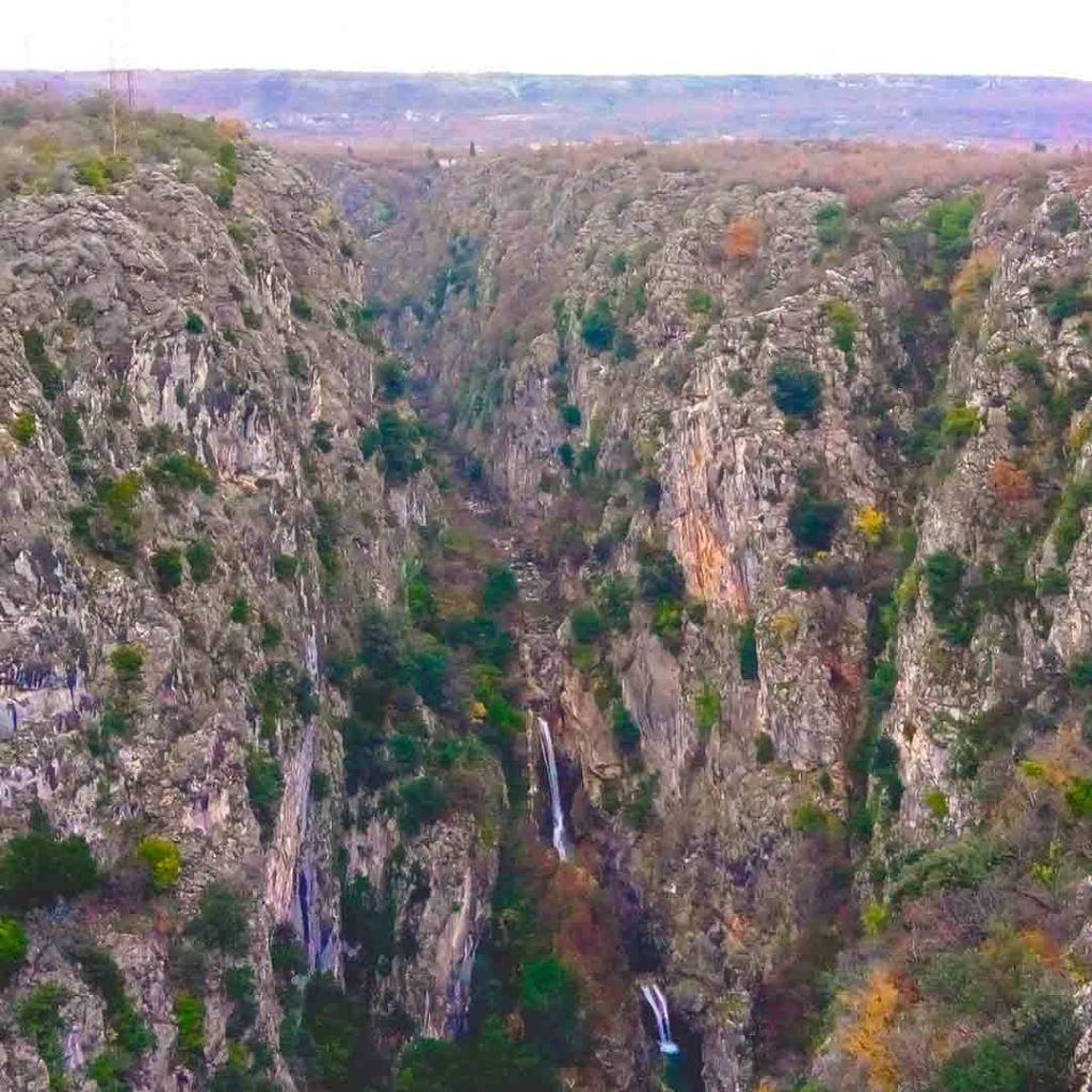 Gubavica waterfalls are in Cetina canyon, formed in the 200 meters deep canyon of the karst plateau of Zadvarje and collapse into their lower bed with a loud noise and crash.