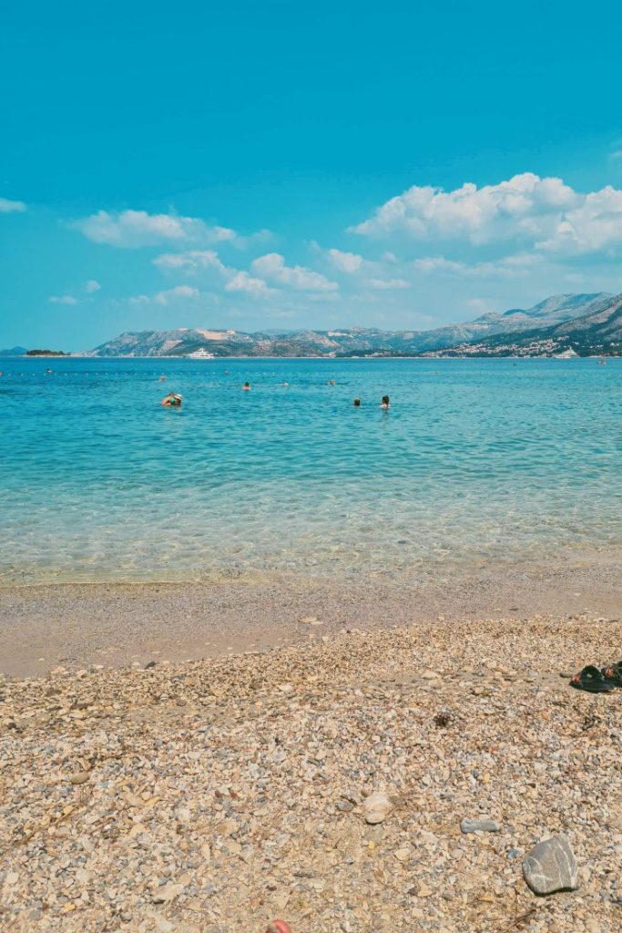 Žal is a shingle beach with small pebbles and cobbles with a light beach face making it very easy to enter the sea.